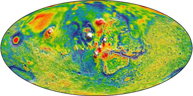 A Martian gravity map showing the Tharsis volcanoes and surrounding flexure. The white areas in the center are higher-gravity regions produced by the massive Tharsis volcanoes, and the surrounding blue areas are lower-gravity regions that may be cracks in the crust (lithosphere).